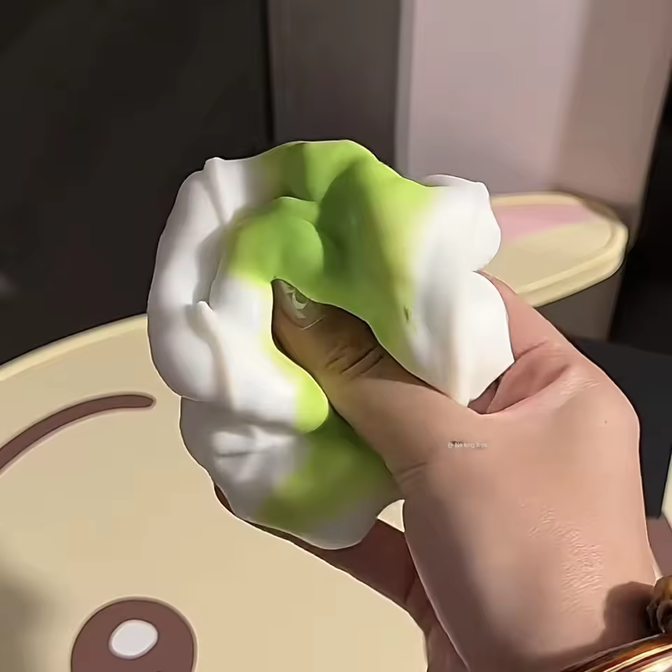 Pistachio-style crunchy rubber squishy ball